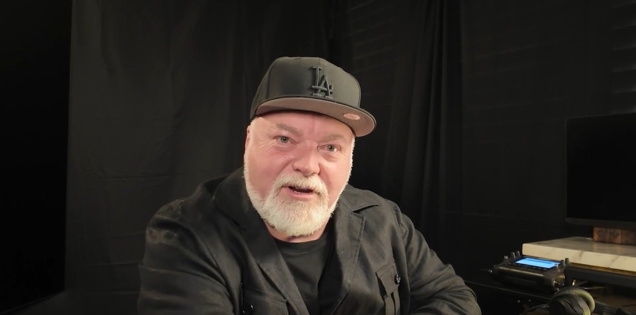 Kyle Sandilands claims death threats and a network merger gone wrong, not a co-host spat, were the real reasons behind his ARN sacking.